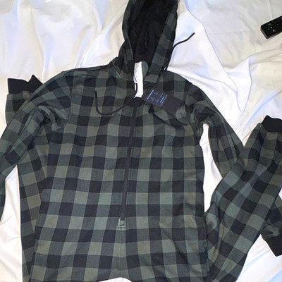 Fabletics Cozy Fleece Hooded Zip jumpsuit w/ Pockets Plaid Gray/Black S