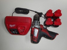 Milwaukee M12 C 12 DD Akkuschrauber mit Ladegerät und 4 Akkus; gebraucht