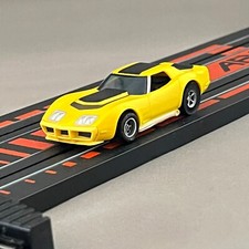 AFX Chevrolet Corvette Yellow Black M-007 HO Slot Car Tomy In Stock