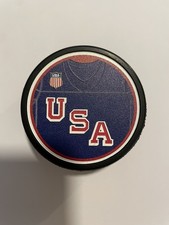 Brand new w/sticker Team USA logo Hockey Puck 2026 Milan Olympics Gold Medalists