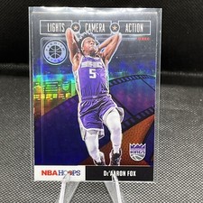 2019-20 NBA Hoops Premium Stock De’Aaron Fox 3 Lights Camera Action Purple Prizm