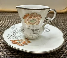 Vintage Ucagco Embossed Tea Cup And Saucer