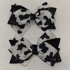 Set Of 2 Cow Themed Girl Clip Bows