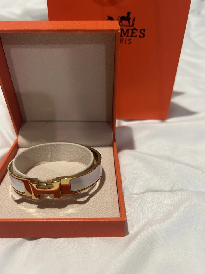 Brazalete brazalete Hermes Clic H dorado y blanco para mujer Foto 4 de 4