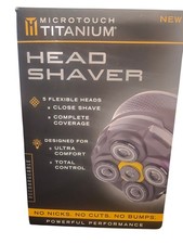 ProductMicrotouch Titanium Electric Head Shav...