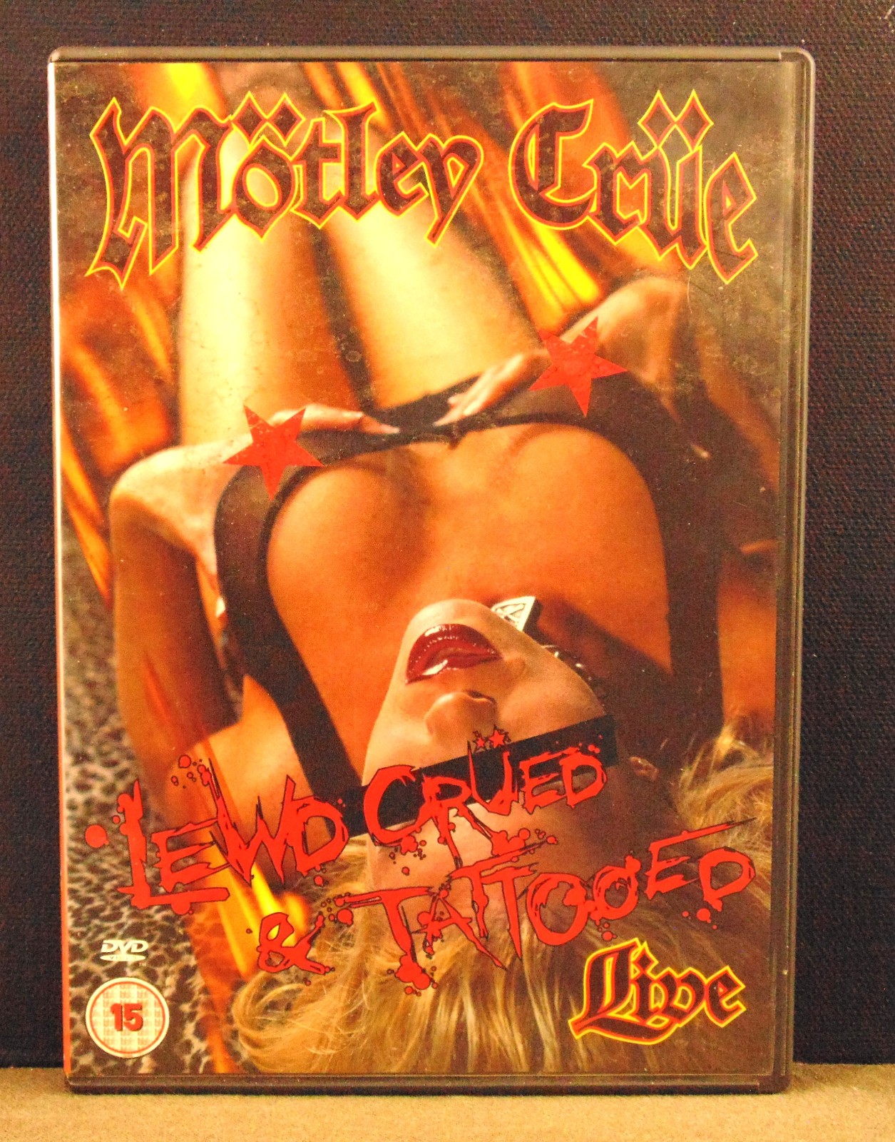 MOTLEY CRUE LEWD CRUED & TATTOOED ---- UK FORMAT