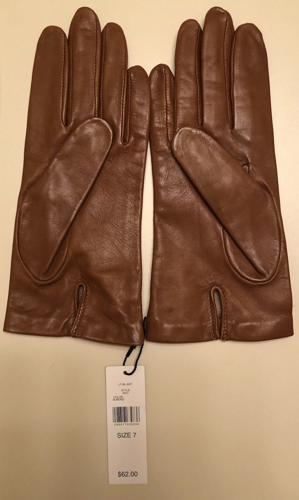 Lord & Taylor Genuine Leather Gloves, Almond/Lt. Brown, Size 7. Never Worn
Opens in a new window or