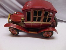 Vintage Rosko Battery Operated "Grand-Pa" tin litho car Japan red color 9" x 5"