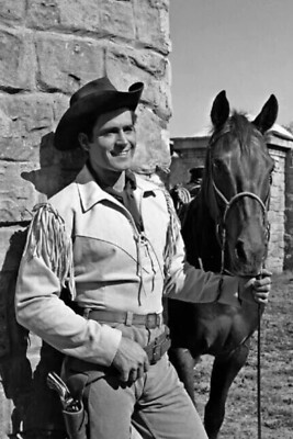 Clint Walker in fringed western jacket holding horse as Cheyenne 4x6 photo