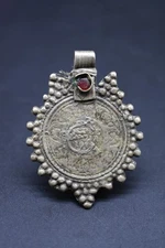 Near Eastern white metal pendant with insert