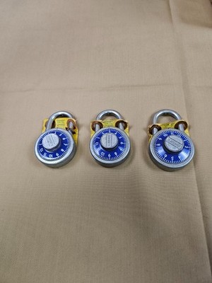 Three classic Slaymaker combination locks with code cards