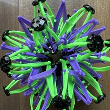 Expandable Sphere Green & Black expands 6 to ...