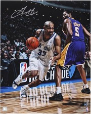 Grant Hill Orlando Magic Autographed 16" x 20"Driving to the Basket Photograph