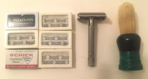 Vintage twin blade "butterfly" razor with blades and brush