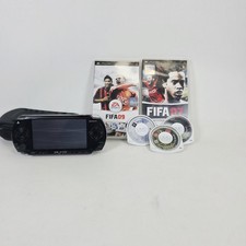 Sony PSP 1004 Handheld System Black/Silver With 4 Games
