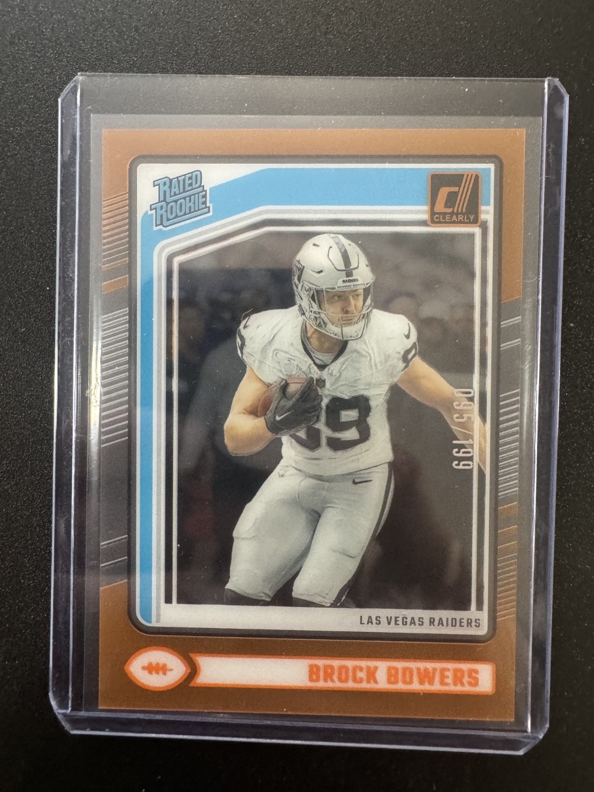 2024 Panini Clearly Donruss Rated Rookie Brock Bowers #57 Orange /199 (RC)