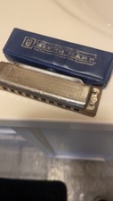 harmonica good condition brand is M.HOHNER BLUES HARP the box color is blue