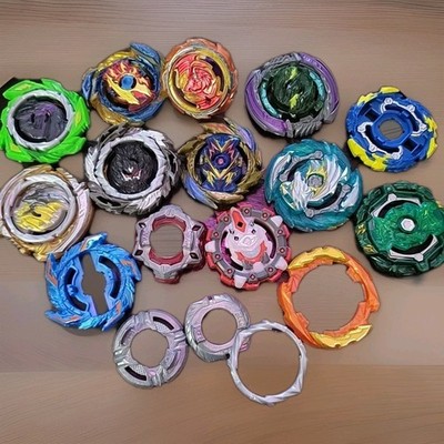 Beyblade Lot of mixed misc parts, bey top pieces and others as seen
