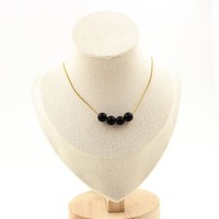 Steine Und MinéRaux. Halskette 4 Perlen Schwarz Onyx Matt 8 Mm. Kette Stahl Gold