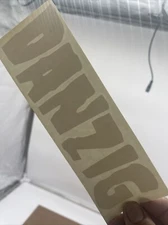 Danzig White Vinyl Decal: 7 1/2” X 2 1/2”, Nor For Porous Surfaces, Peel Off