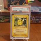 PSA 7 Pikachu 60/64 Jungle Set 1999 Pokemon TCG Regular English WOTC