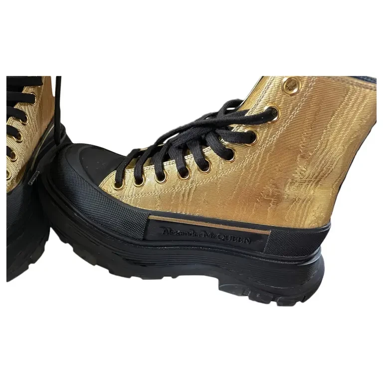 Alexander McQueen — alexander mcqueen boots women gold and black size 8 greatcondition only worn 2x