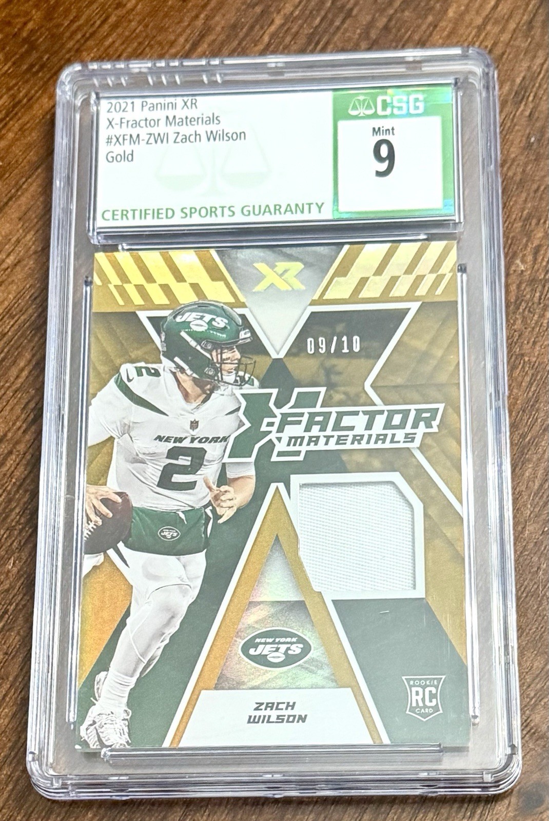 Zach Wilson Panini XR X-Factor Materials #ZWI Gold