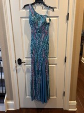 Brand new blue Sequence PROM dress, with tags never worn, BLONDIE NITES.
