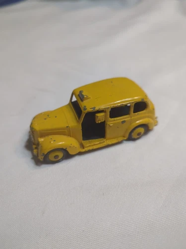Vintage Meccano Dinky Toys tin Taxi Yellow With Paint Wear