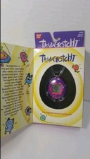 Rare 1996 hot pink/purple Tamagotchi MIB