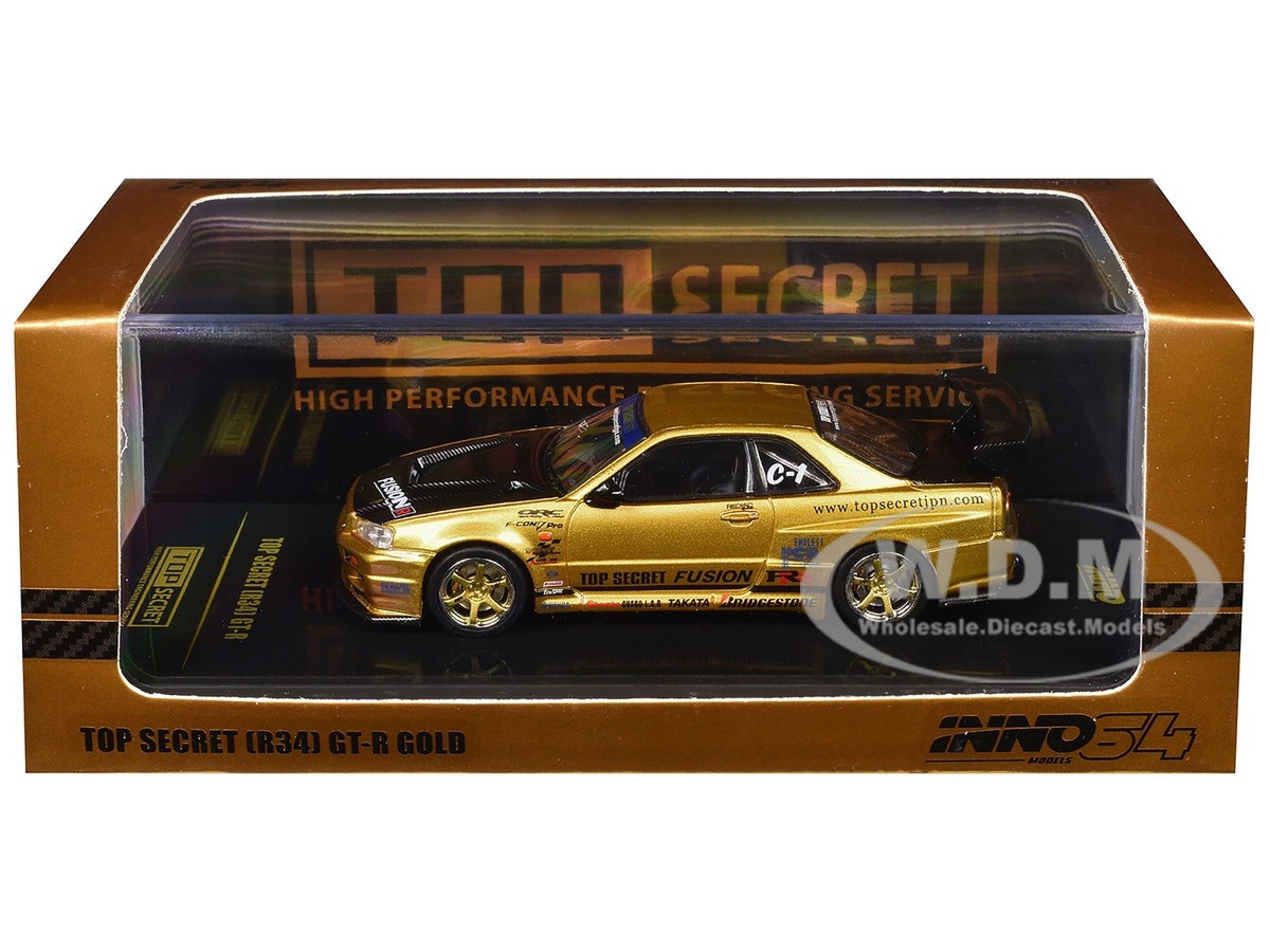 NISSAN SKYLINE GT-R R34 RHD TOP SECRET GOLD 1/64 BY INNO MODELS