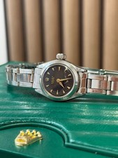 Rolex Ladies Black Gold Dial
