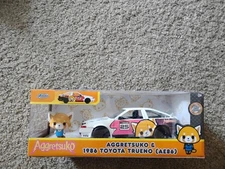 JADA HOLLYWOOD RIDES AGGRETSUKO 1986 TOYOTA TRUENO AE86 1/24 with FIGURE 33725