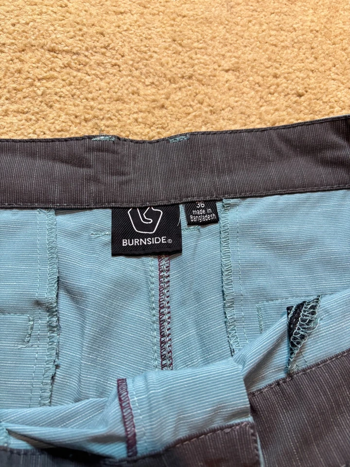 Bañador de golf Burnside para hombre con tabla frontal plana de secado rápido azul verde 36 Foto 2 de 3