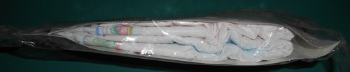Vintage 1994 Huggies Ultratrim Diapers Sample Package Plastic Boys Girls Size 4 - Picture 3 of 3