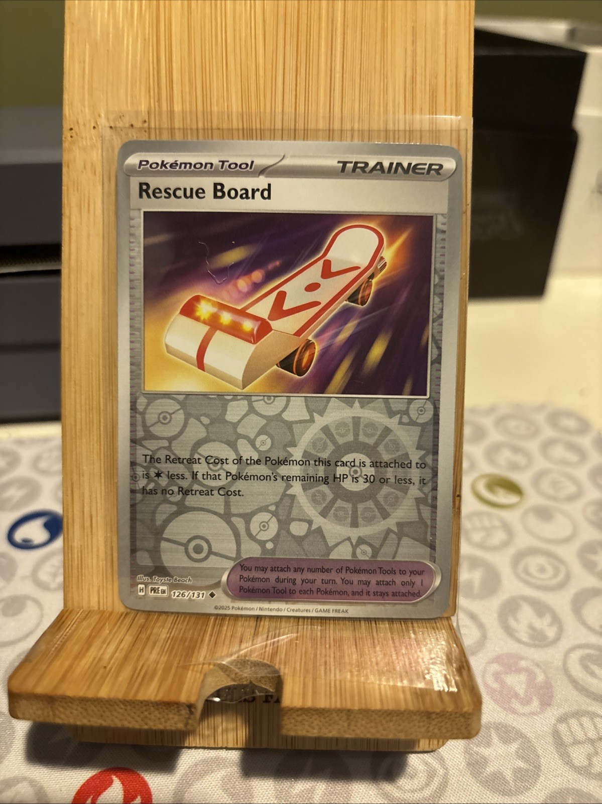 Rescue Board 126/131 Sv: Prismatic Evolutions Reverse Holo Pokémon TCG NM