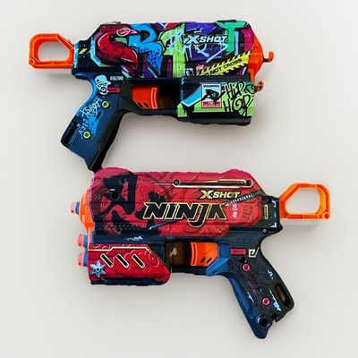 X-Shot SKINS Flux Dart Blaster 2pk Combo- Ninja & Graffiti by ZURU With 5 Darts