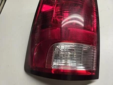 2013-2016 Dodge 1500 Left Taillight Incandescent; LH, Scuffs/Scratches.