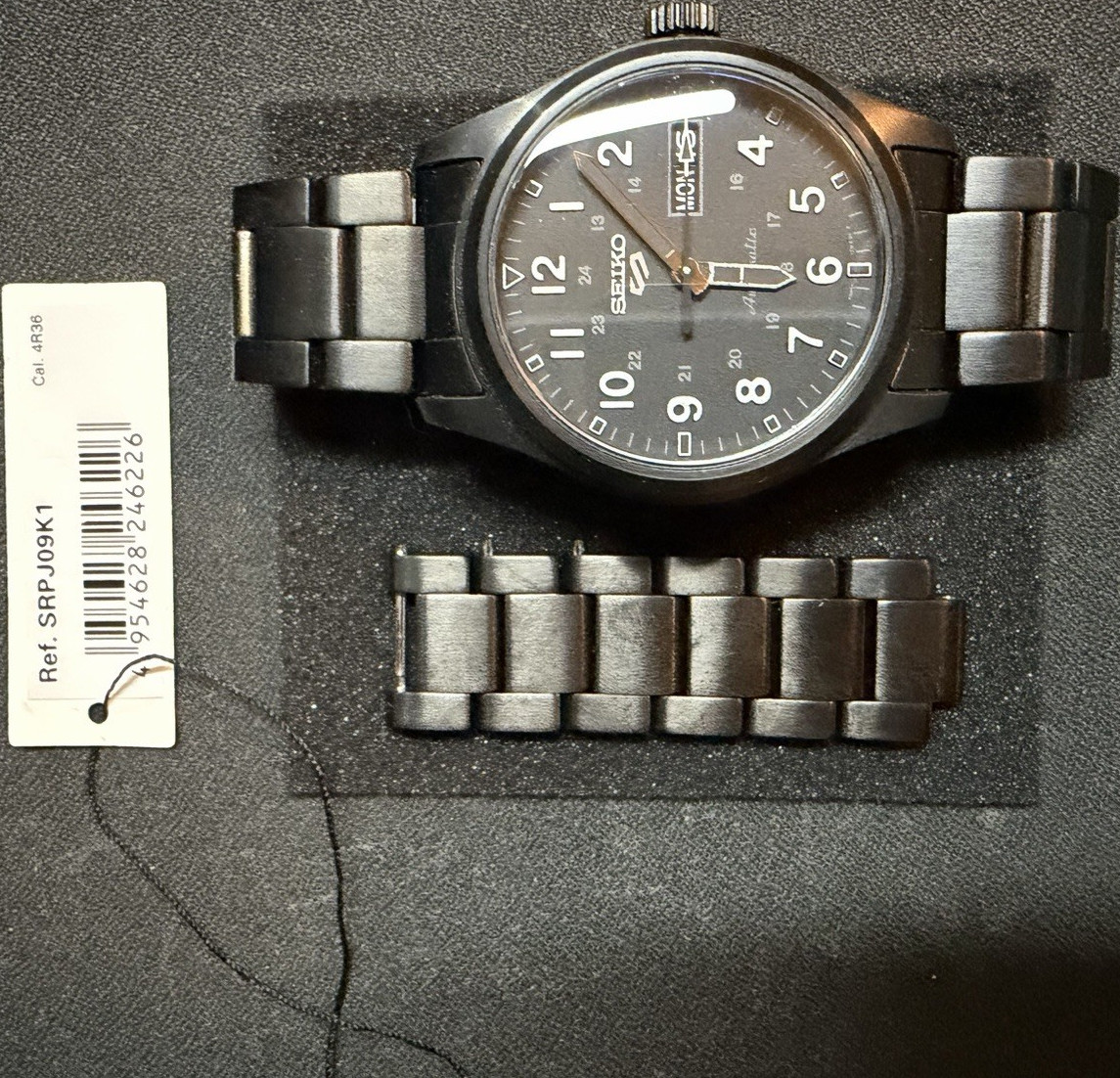 Seiko 5 SRPJ09K1 Automatic Day/Date Black Dial Black Metal Bracelet