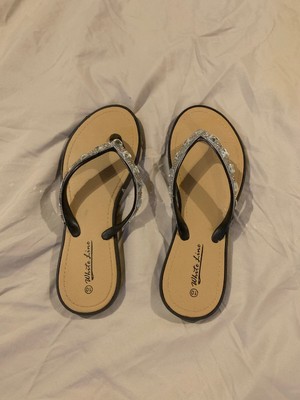 white line flip flops