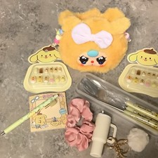 Sanrio Pompompurin stationery set with notepad, pens and accessories