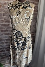 60s Vintage Gino Charles for Malcom Starr Black Brown Woven A-Line Floral Dress