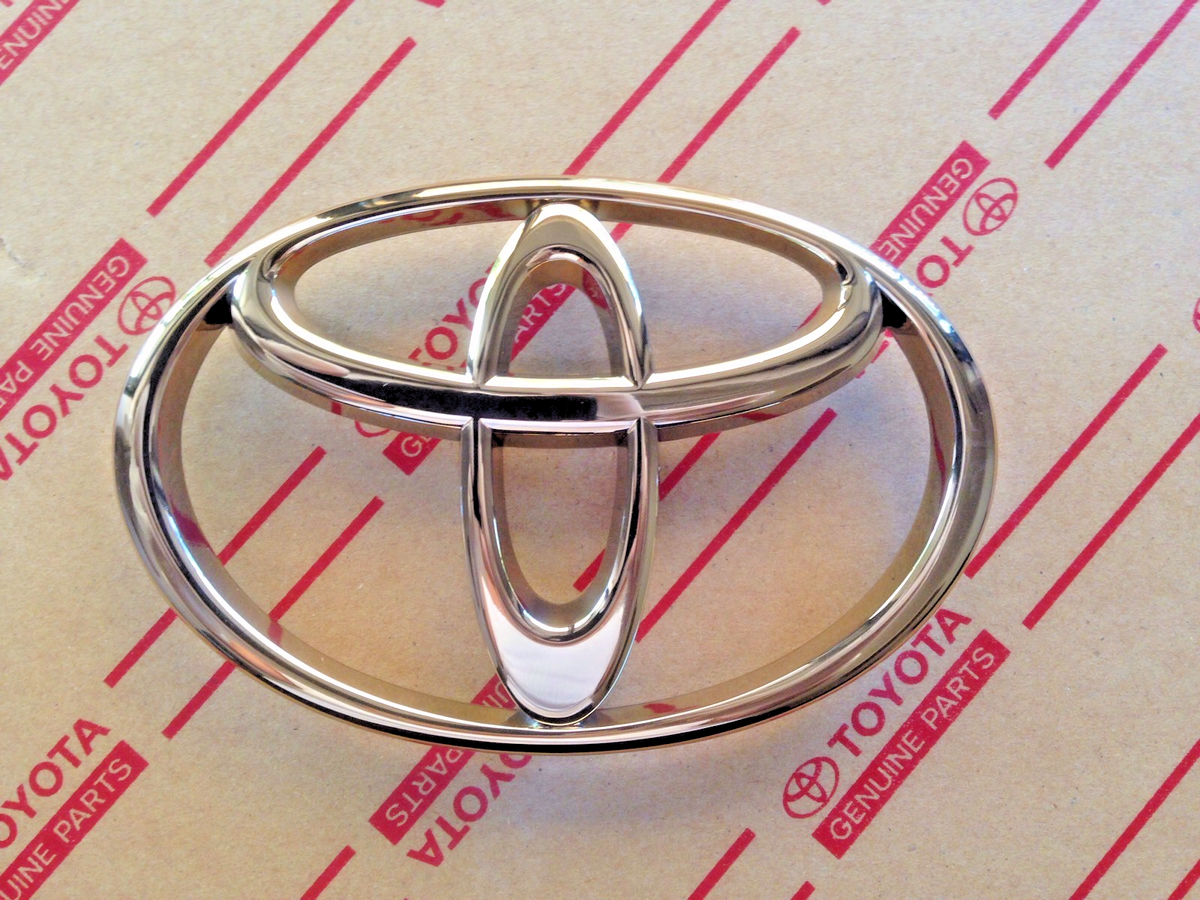 Genuine OEM Toyota Land Cruiser Front GOLD grille emblem 1995-2002