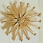 Vintage Monet Gold Tone Starburst Sunburst Brooch Pin Signed Costume Jewelry