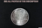 NobleSpirit Some Toning 1986 American SILVER Eagle .999 Fine