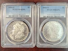 TWO 1884-O PCGS MS 62PL MORGAN SILVER DOLLARS CONSECUTIVE NUMBERS. PROOFLIKE