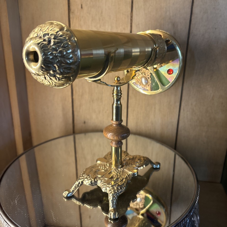 A 12-inch dual-wheel Gatco brass kaleidoscope loaded with faux jewels and glass — serious statement piece with serious vintage pedigree.