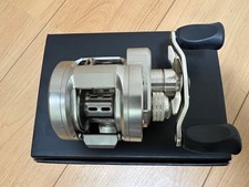 Daiwa RYOGA 1016H Baitcasting Reel Metal Double Handle Silver/Black Used