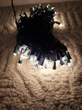 CHRISTMAS LIGHTS ONE STRAND OF 200 CLEAR MINI LIGHTS GREEN CORD