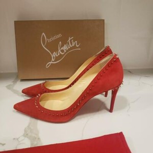 red spiked louboutin heels